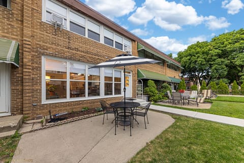 Discover a serene retreat in our lush garden, with a BBQ grill and a cozy dining area. Whether you're gathering around the fire pit for a warm evening chat or enjoying a starlit meal, this space offers a delightful blend of nature and comfort right in the heart of Lincoln Square.