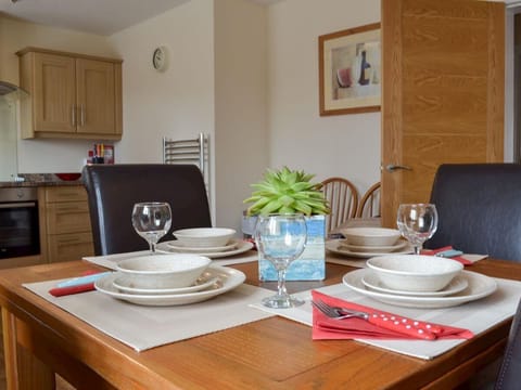 Dining table extends out to double size.