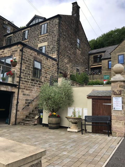 Steps, right hand side of garage door leading up to main front door.