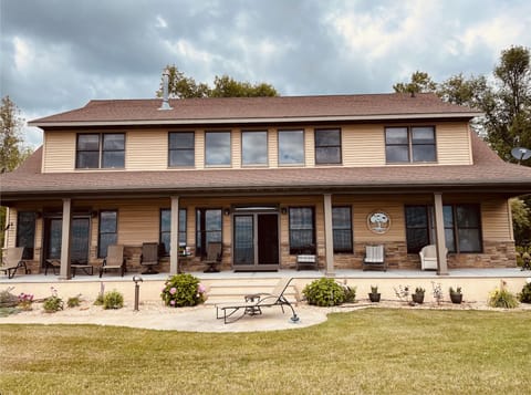 Spacious lakeside retreat with a welcoming wraparound porch