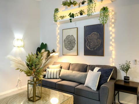 Living Room with Seating, Garden Shelves, Large Coffee Table, and 54" TV