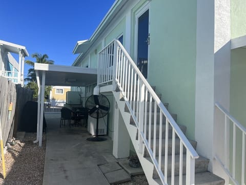 Fish fryer/BBQ to cook your fish outdoors. Sink, seating and freezer across.