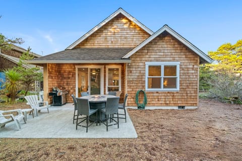 New home with private back yard including fire pit and patio area