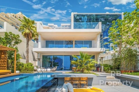 Stunning 13,000 square foot FIVE Palm Beach Villa spread across three floors, featuring elevator, large temperature controlled private pool to the rear / beach side garden, and a large jacuzzi on the top floor 