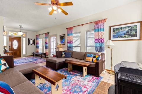Beautiful stained-glass transom casts a warm glow on this downtown New Braunfels vacation rental.