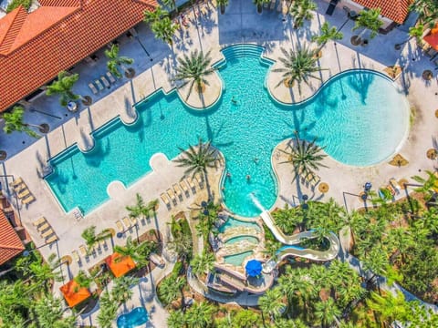 Community pool with slides, lazy river, restaurant, and hours of fun-in-the-sun