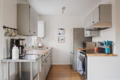 Kitchen has all the amenities of a true home, plus basic cooking essentials.