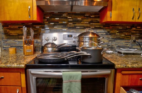 Well stocked: Variety of pots and pans as well as knife block & utensils.