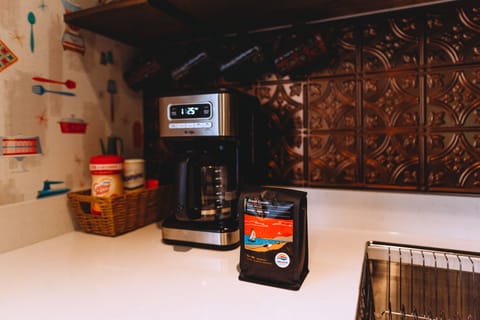 Full kitchen with amenities. Drip Coffee maker and coffee beans and accessories