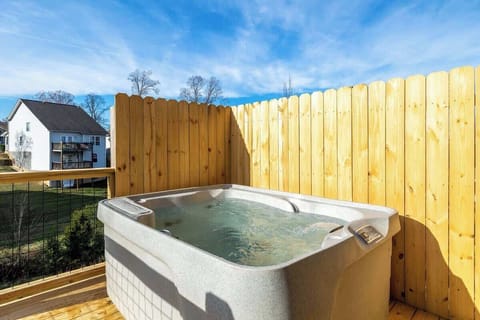 A little slice of paradise right at home! This hot tub on the deck is the ultimate spot for relaxation. Let the bubbles wash your worries away!