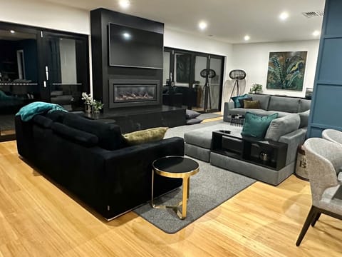 Large open plan living with gas fireplace