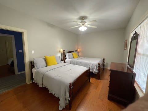 Annie Teaks room. First bedroom sleeps 4. One queen and one full bed