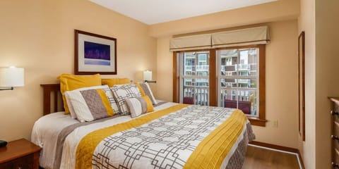 Cozy up in this inviting bedroom after a day on the slopes.