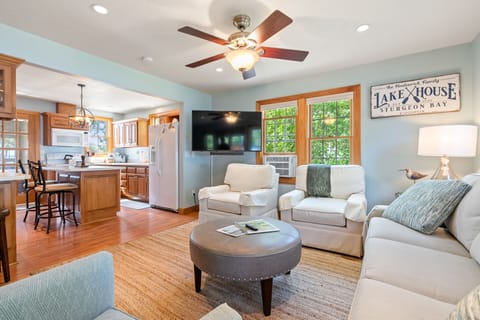 Modern, comfortable seating, includes a Smart TV and window AC unit