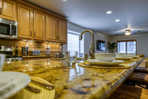 Sit down at the chef's island for a meal.