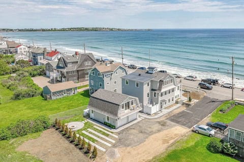 Just steps from the salty air and surfing waves...