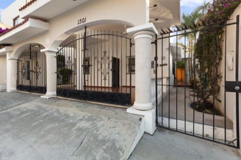 The front of the house. There is a carport with room for one car.