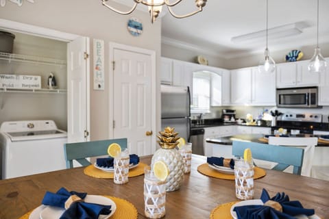 Dining Area offers a 4 top table inside, with additional seating at the bar.