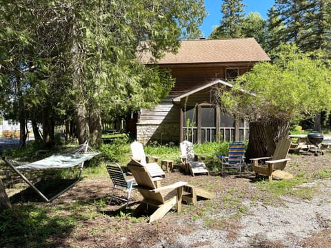 Side yard with seating and hammock