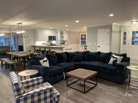 Open concept family room with sectional 