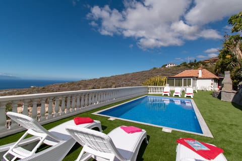 View of upper level private pool and villa