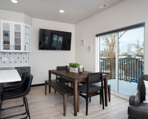 Dining Area with Direct Access to the Balcony and BBQ Grill.