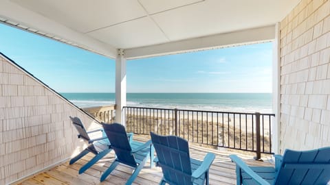 Relax with panoramic Atlantic views from your private beachfront balcony.