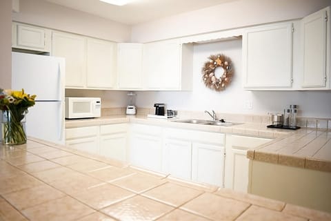 Kitchen. Exact unit will be assigned upon arrival. Views, colors, and decor may vary