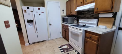 Kitchen with many amenities and walk in pantry