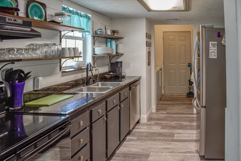 Kitchen - Kitchen has stove, refrigerator, microwave, coffee maker and most items you would need.