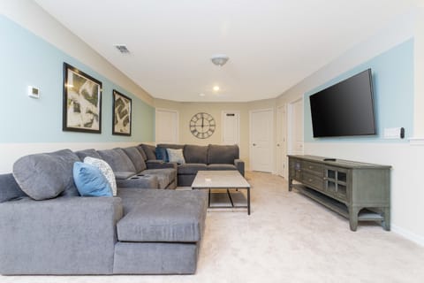 Seating area in the loft space. Showing TV wall placement.