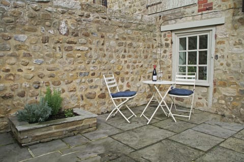 Private patio garden at The Hay Loft in Bishopton, Ripon