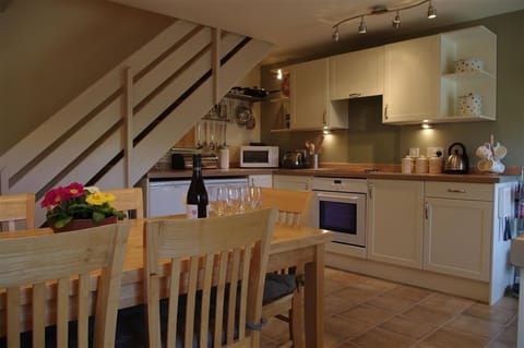 Kitchen with dining area at Hill Top Cottage in Walden dale near West Burton in the Yorkshire Dales