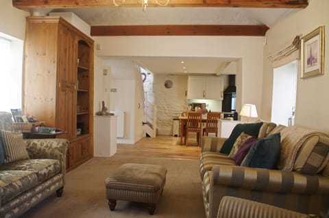 Beautiful and spacious lounge with wood burning stove at Forge Cottage in Masham
