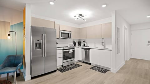 Kitchen view. All brand new and stainless steel appliances.