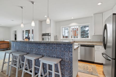 Fully Stocked Kitchen with Breakfast Bar