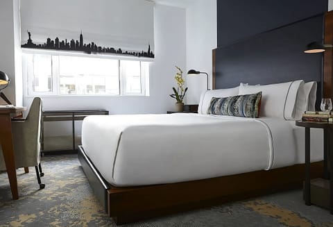 Sink into crisp linens for a deeply restful night’s sleep.