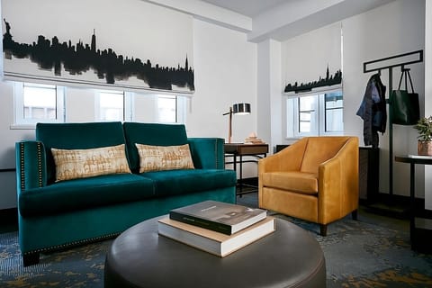 Gather on the plush sofa in a bright, airy lounge.