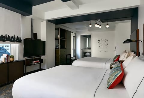 Settle in with roomy comfort, TV entertainment, and desk nook.