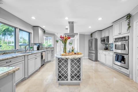 The kitchen holds all your finest amenities with high end appliances, a nice center island and comfortable bar top.