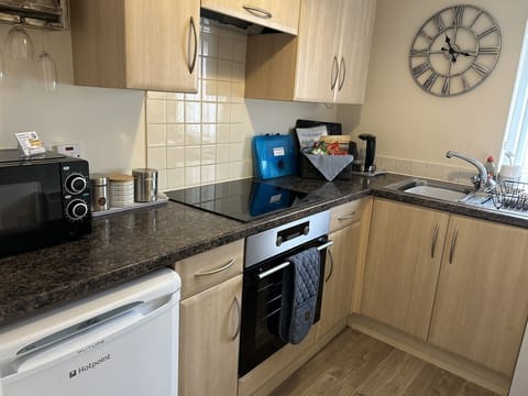 32, Well equipped kitchen with oven, grill, hob, microwave and toaster
