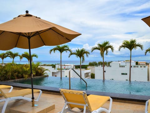 A stunning ocean view rooftop pool on site