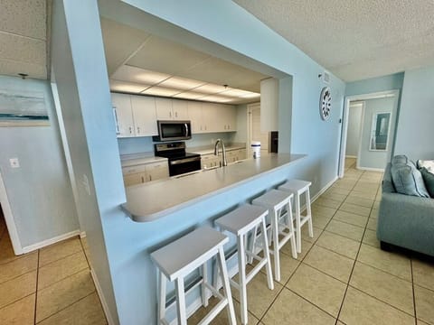 Enjoy meals at the bar in the spacious dining area