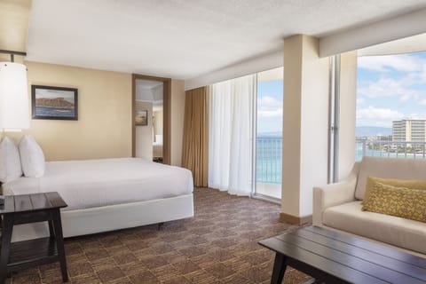Lounge together in a spacious room with calming coastal light.
