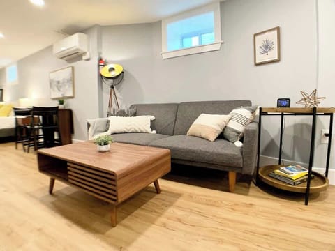 Front view of the sofa area. 
The current sofa is a bit larger and more comfortable. Suitable for 1 large person or 2 children. 
If you need more space, we can provide you with an additional rollaway bed. 