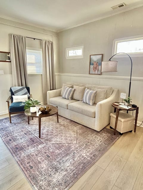 Cozy living room for relaxation or visiting. Sofa pulls out into a queen bed. 