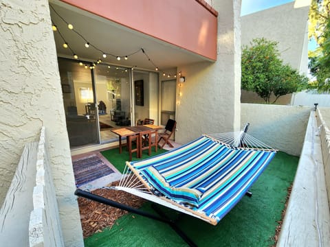 Private patio with relaxing hammock looking at the sky and hearing birds chirp!
