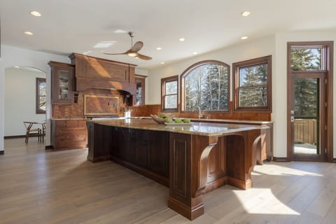 Your mammoth family kitchen.  Wolf appliances, bosch dishwasher, every gadget.