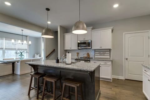 Formal dining off the kitchen! Additional seating throughout downstairs.
