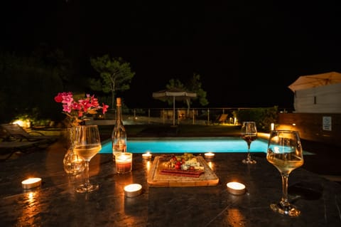 Elegant evening dining around the pool